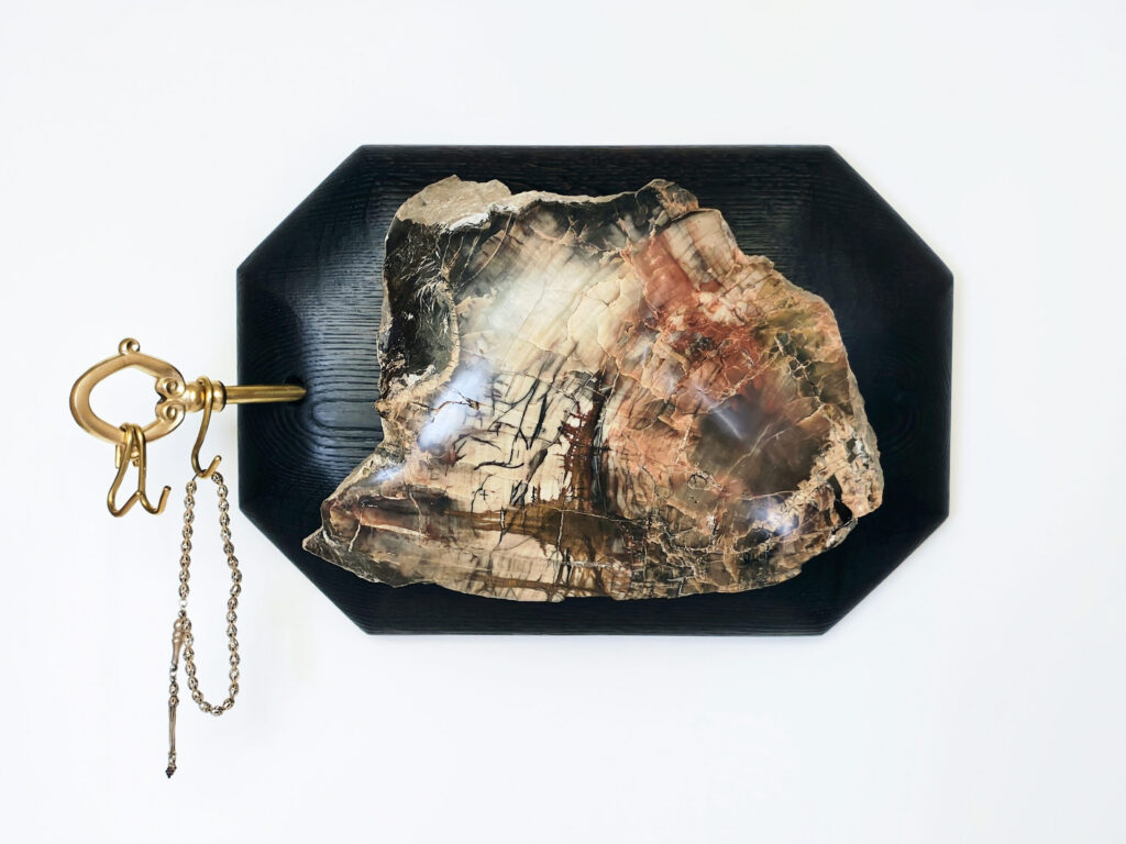 The Keeper’s Key — petrified wood art object by Petravo